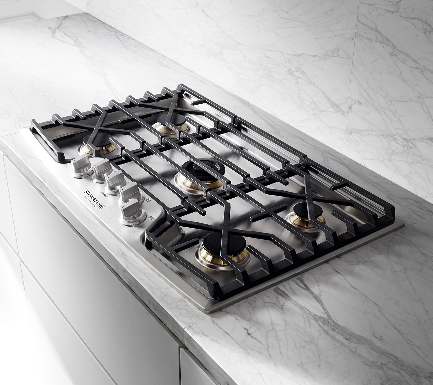 Gas cooktop with cast iron grates from Signature Kitchen Suite